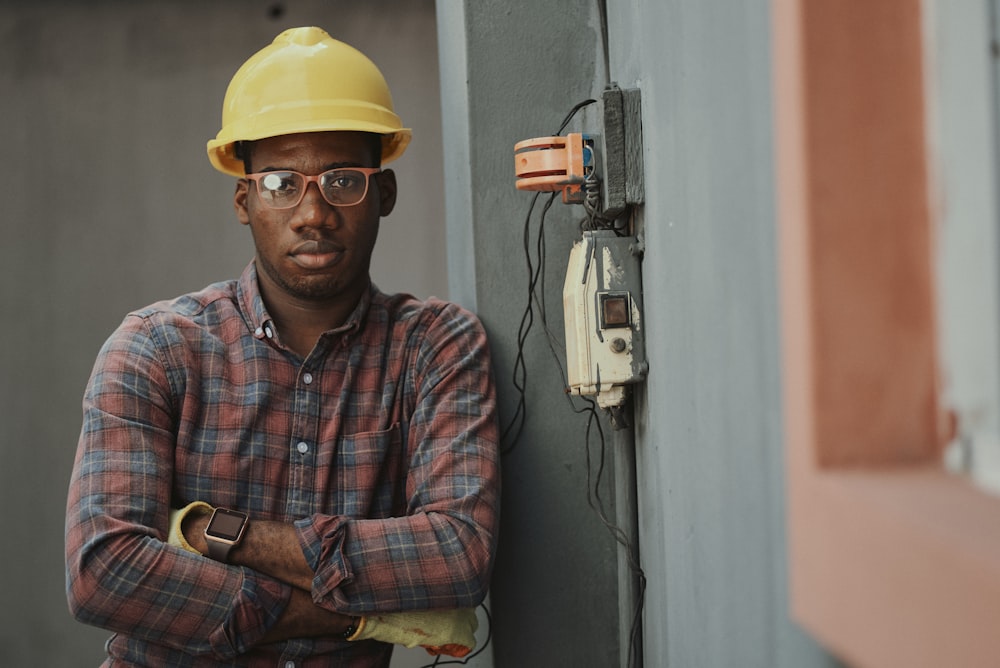 Licensed electrician working on an electrical panel